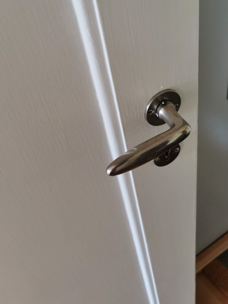 Detalj på beslag, 30-tal, dörrtrycke